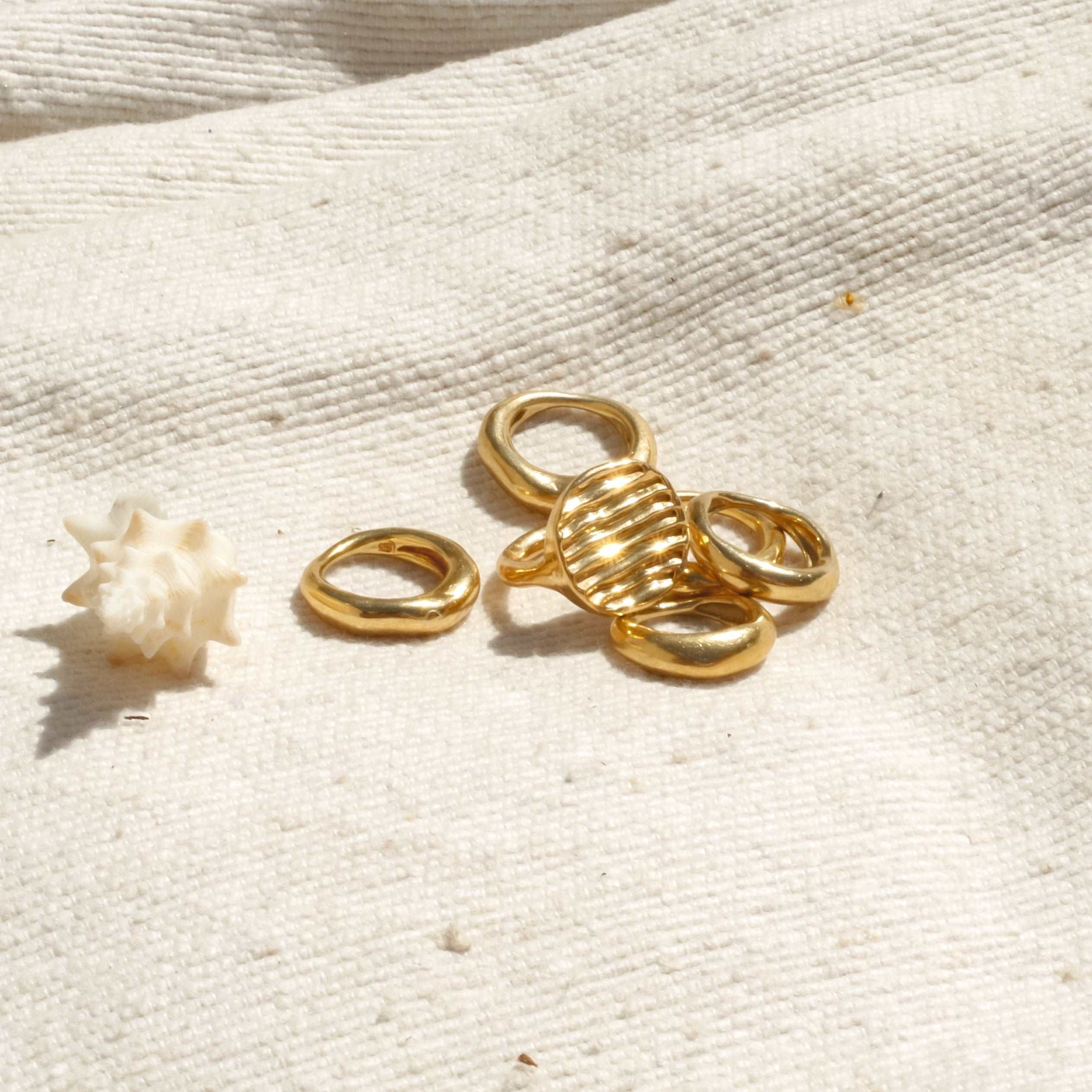 sun dancing on ocean ring