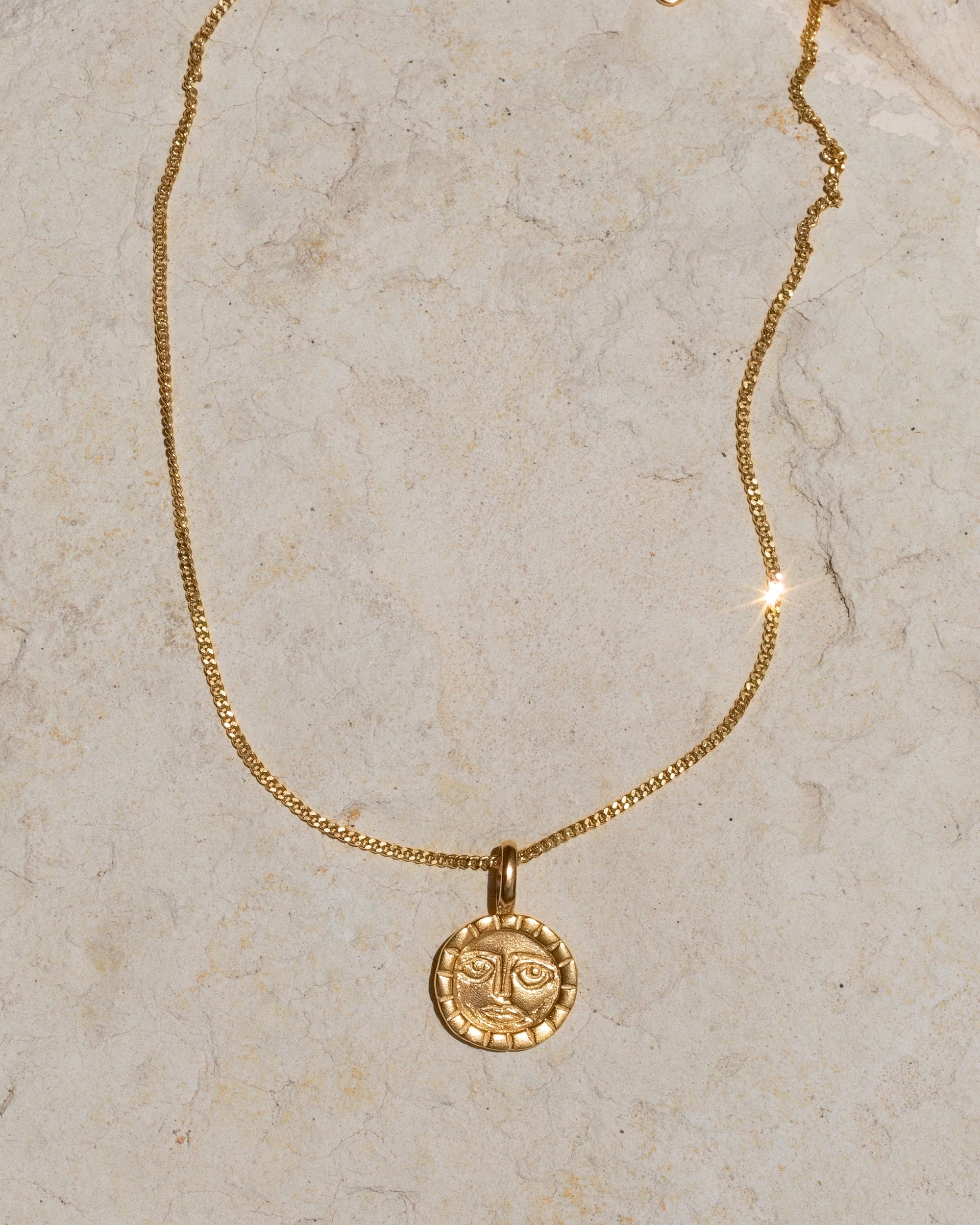 SUN CHARM NECKLACE