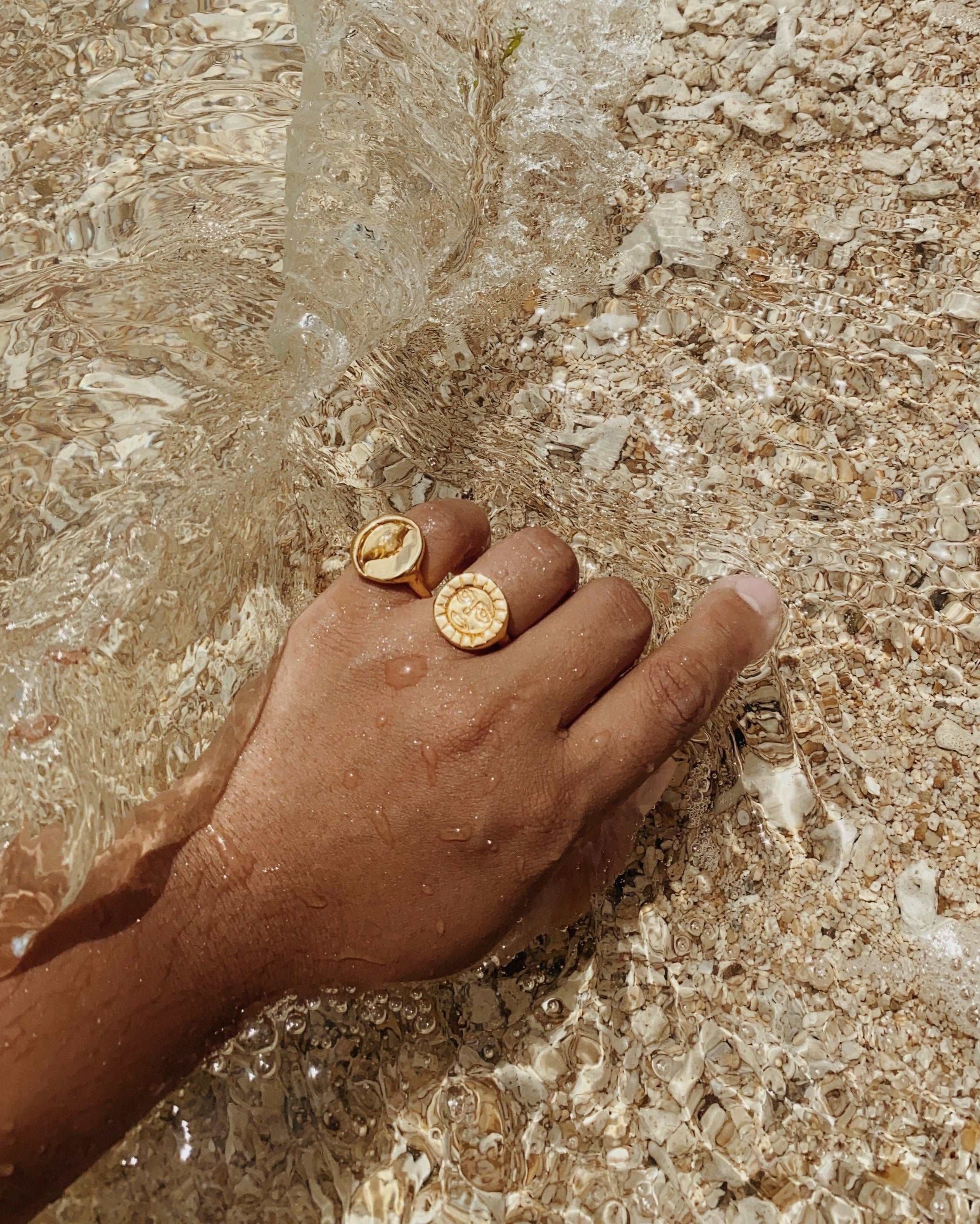 @viancasoleil wearing the gold sun ring paired with the moon ring