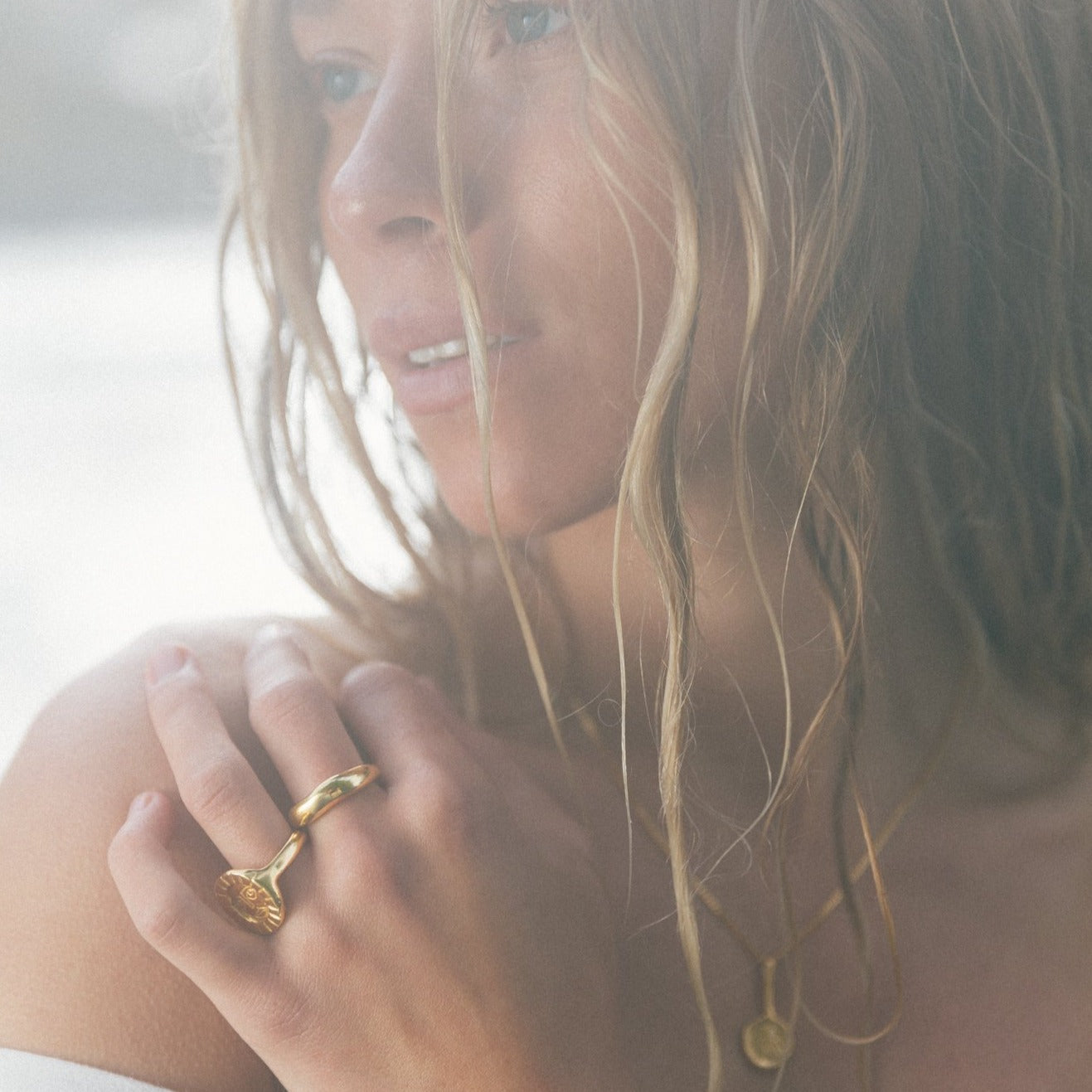 @juliannalaine seaside in gold rings. photo by @oliviavandyke