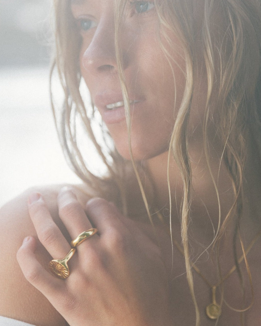 @juliannalaine seaside in gold rings. photo by @oliviavandyke