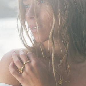 @juliannalaine seaside in gold rings. photo by @oliviavandyke