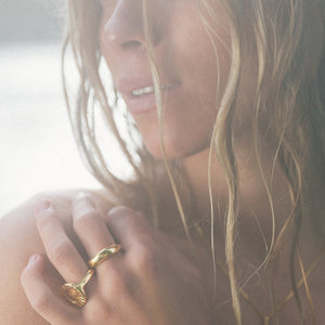 @juliannalaine seaside in gold rings. photo by @oliviavandyke